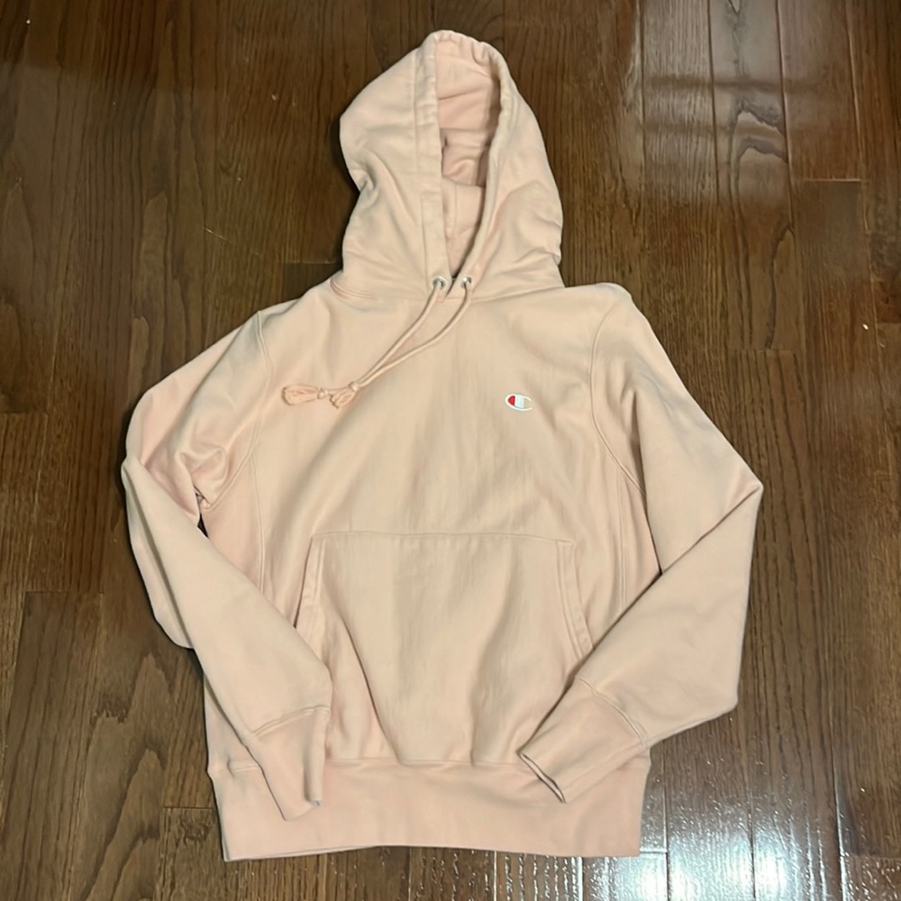 Brand NEW champions hoodie in a soft pink color